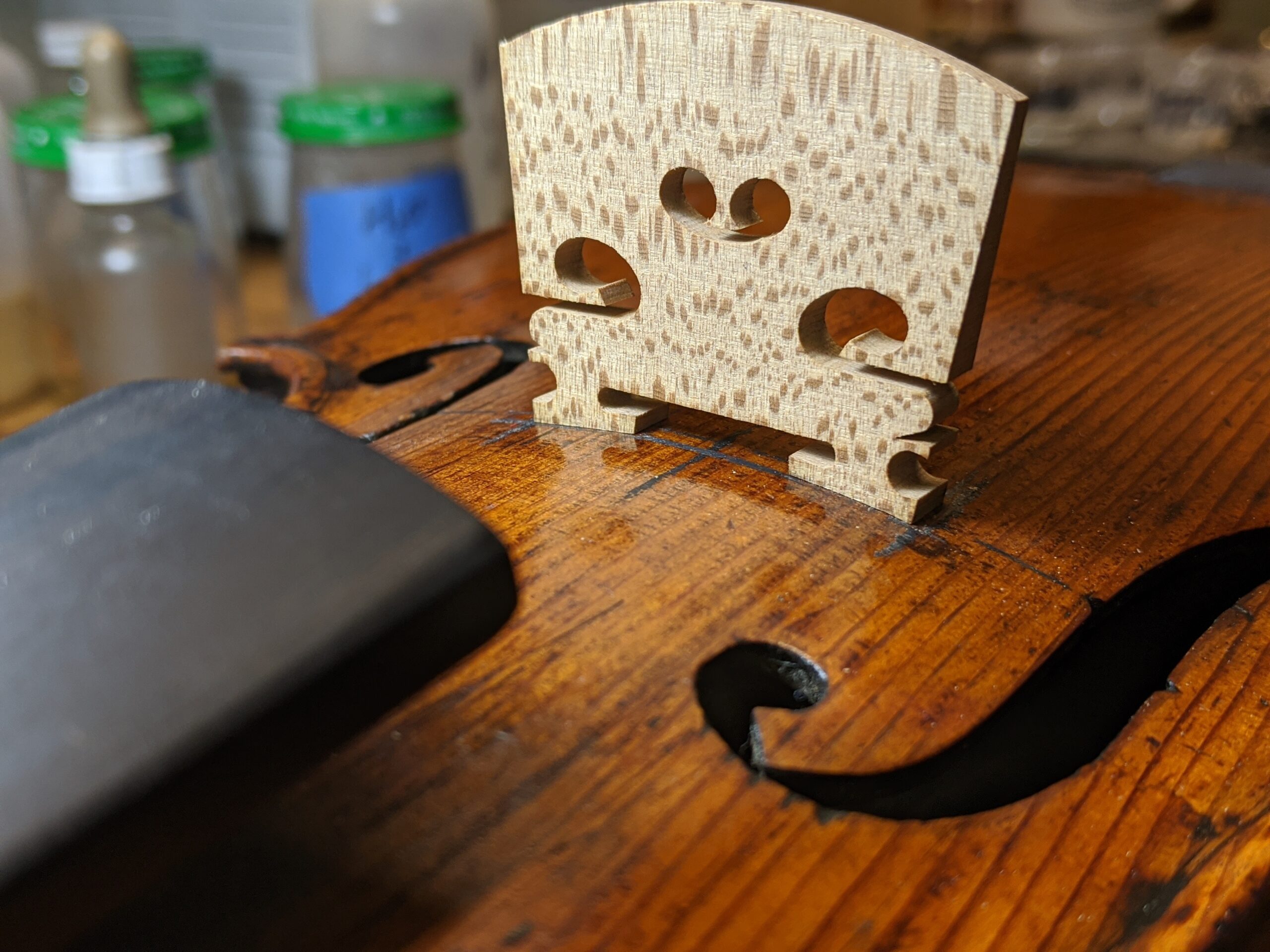Violin-repair-fitting-new-bridge